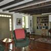The plaster ceiling was removed to reveal  the original hand hewn timber  joists.